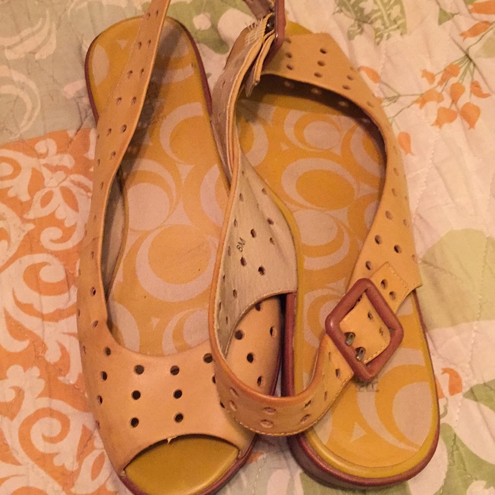 Gorgeous mustard sandals with a slight “wedge”
